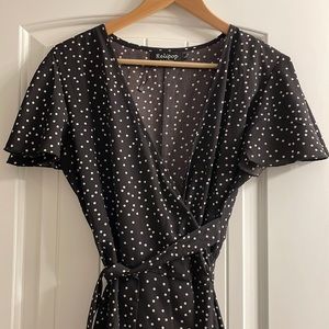 Black and white polka dot wrap dress